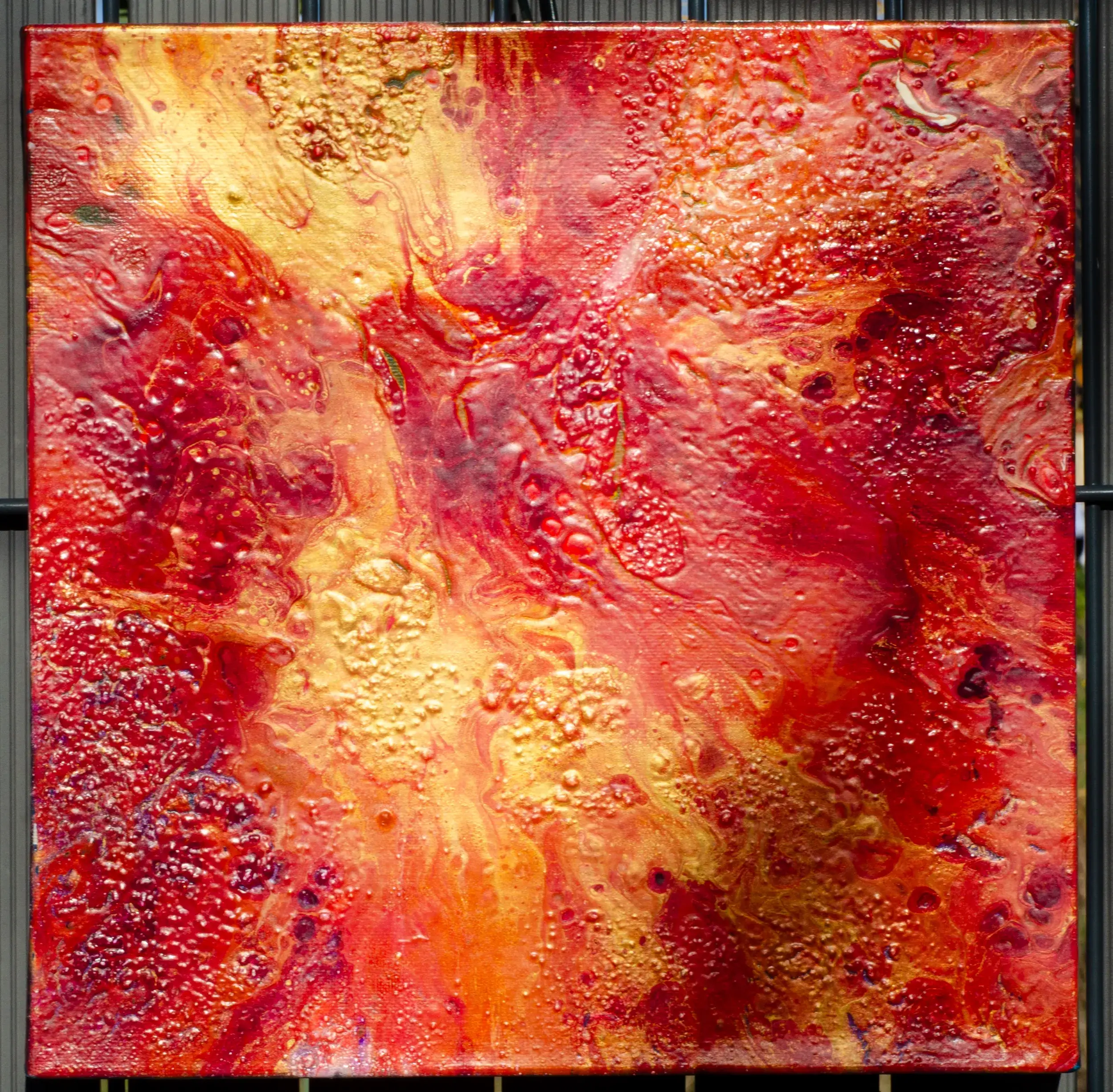Tableau pouring rouge orangé